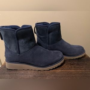 Blue Ugg boots with a slight heel
